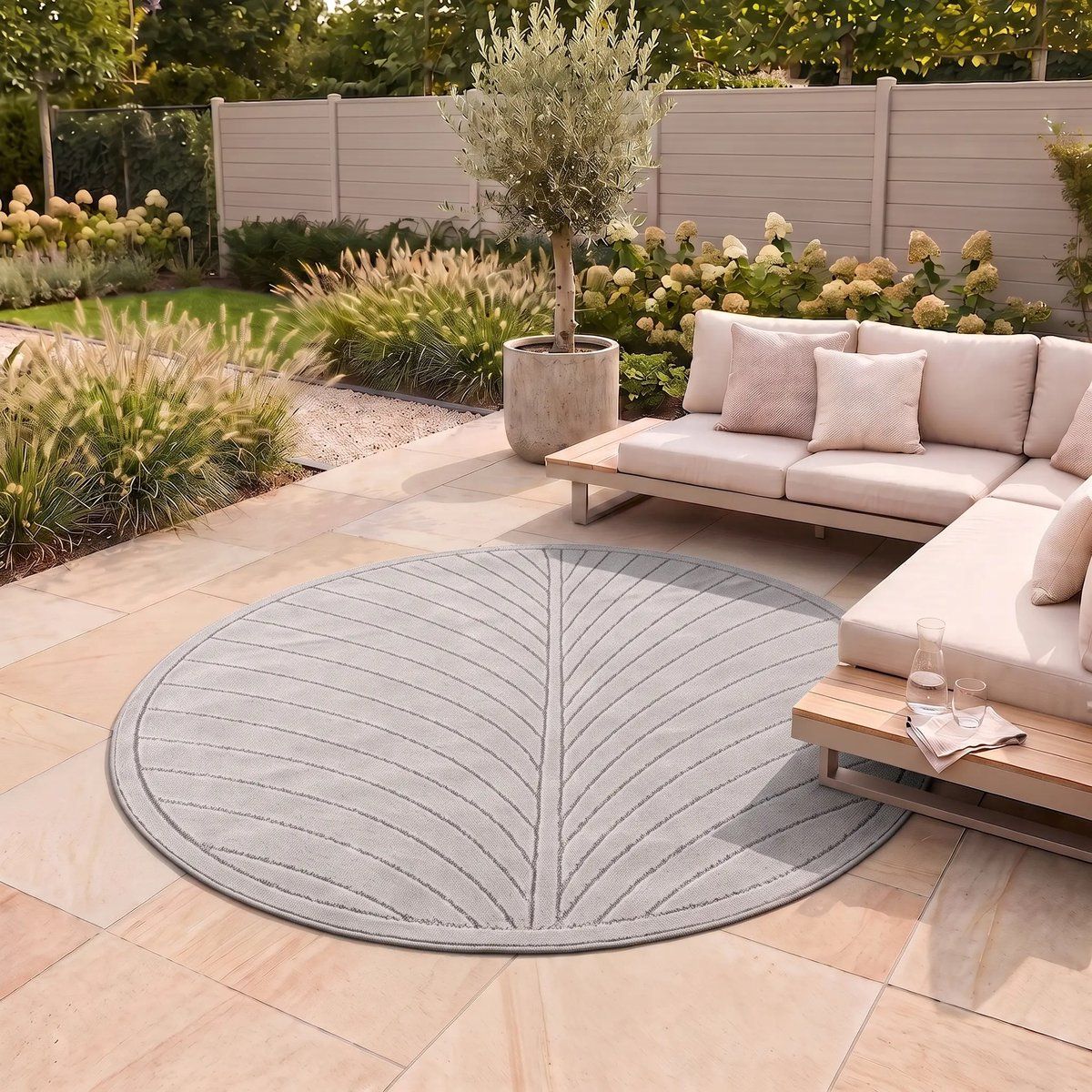 flycarpets novara palmblad rond buitenkleed grijs buitentapijt
